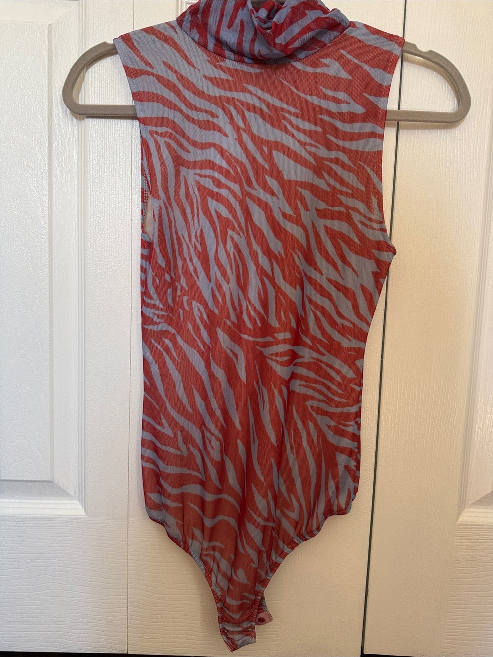 Free People Sleeveless Turtleneck Zebra-Print Bodysuit in Rust and Light Gray